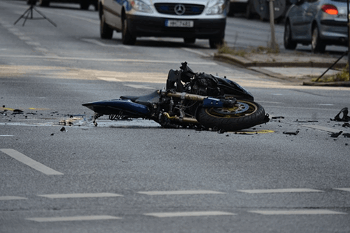 A motorcycle caught in a road-side accident.
