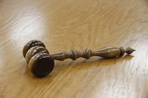 gavel on a wooden table
